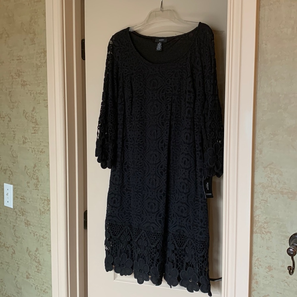 Black semi formal dress. Never worn